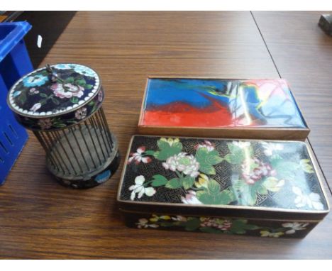 A white metal and cloisonné cricket cage with floral design, 15cm (6in), a cloisonne cigarette box c.1920s with floral and ge