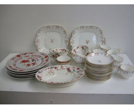 A quantity of ornate hand painted china to include a part tea set decorated with a gilt laurel leaf design, five large Chines