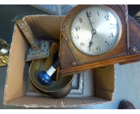 A number of Chinese brass chargers and bowls, a brass candle stick, butlers brush, and an Art Deco Smiths Electric mantle clo