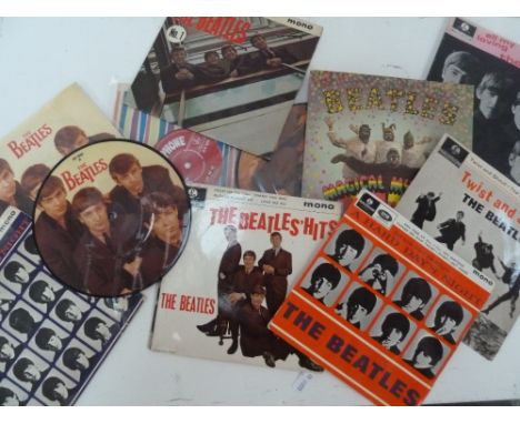 THE BEATLES - A COLLECTION 0F 58 - 7inch 45rpm SINGLES AND EXTENDED PLAYERS (EP's). MAINLY FIRST PRESSINGS, INCLUDES RARITIES