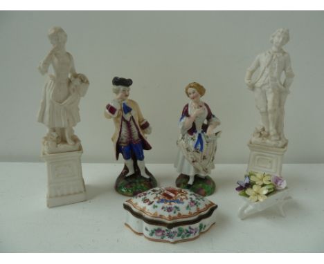 A quantity of china to include two pairs of figurines (repairs), a Simpsons of Paris trinket box hand painted with heraldry a