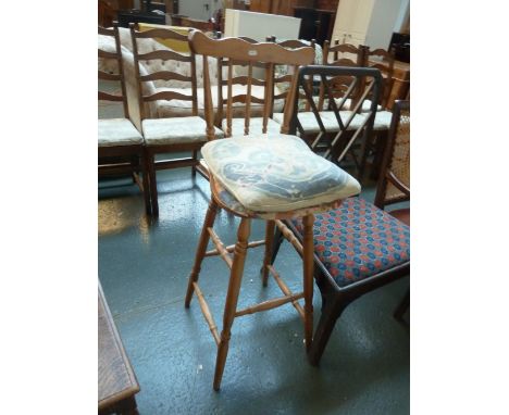 A light elm spindle back high chair / stool