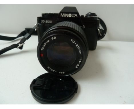 Minolta X-300 35mm camera with Tokina lens 70-210mm 1:4-5.6