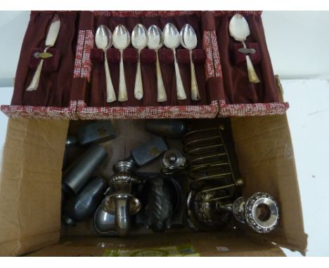 A quantity of silver plated items, including a candlestick, a toast rack, heart shaped box, and a miniature urn