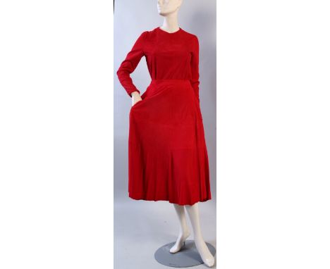 A 1970's Red Suede Skirt and top.  Very soft red suede top, beautifully made with long tapering sleeves, back opening with su