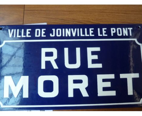 A French blue enamel road sign, reading Ville de Joinville Le Pont, Rue Moret, 45cmW x 25cmH