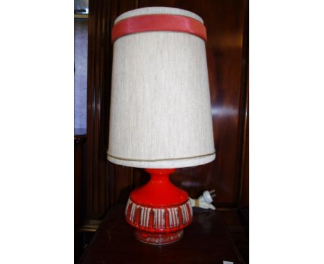 Retro red pottery table lamp with original shade, 51cm high approx.