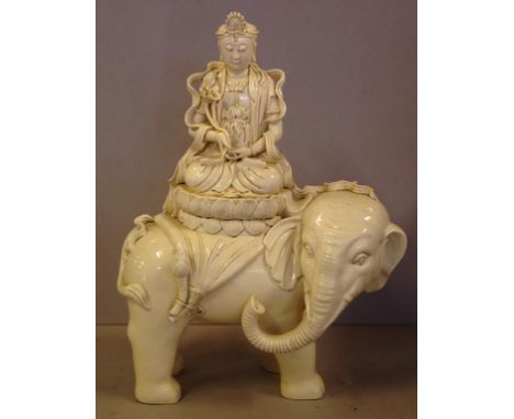 Chinese ceramic Kwan Yin riding an elephant figure reign marks to back, H42cm approx