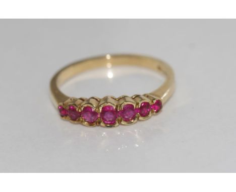 Hallmarked 9ct gold and ruby dress ring weight: approx 2.3 grams, size: O-P/7