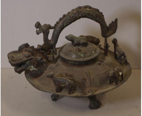 Vintage Chinese metal figural teapot on three feet, with dragon handle spout & handle