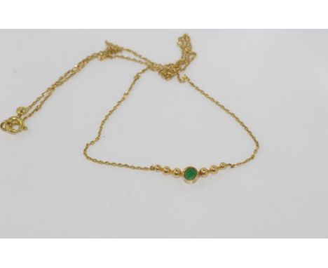 Delicate 18ct yellow gold and emerald necklace weight: approx 2.8 grams