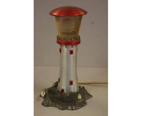 Retro electric lighthouse lamp by F.H. & F.R. West (Australia) c. 1950s, cast iron and brushed aluminium,  stamped to base 'F