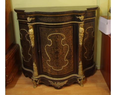 Superb ebonised boulle serpentine cabinet with marble top above an exquisite brass inlay figural ormolu mounted body with a c