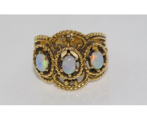 Vintage 14ct yellow gold, solid opal trilogy ring weight: approx 6.2 grams, size: L-M/6 (matching earrings lotted separately)