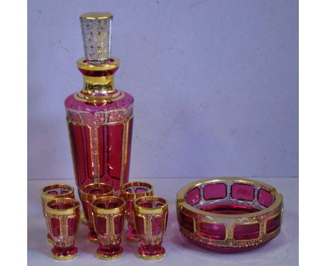 Bohemian ruby flash and gilt liqueur set comprising of a decanter and 6 liqueur glasses, together with an ashtray