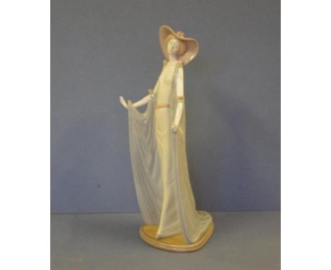 Lladro girl  with hat and cape figurine 36cm high