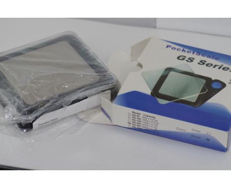 Pocket scale in box