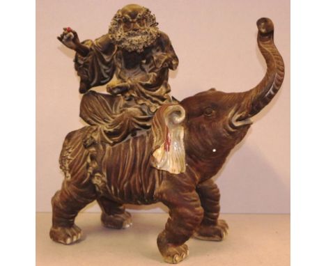 Large Chinese ceramic prophet on a elephant statue stamped to back rear leg, H41cm approx