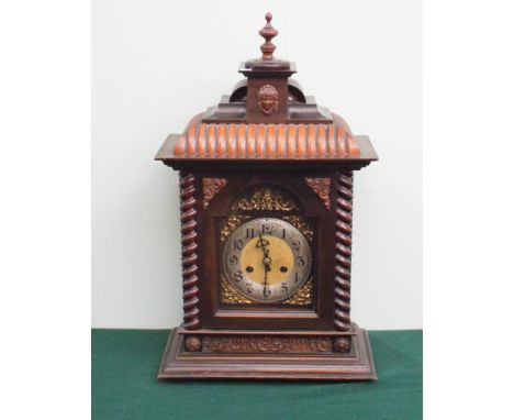 Large Edwardian bracket clock in walnut case with arched brass and silver dial with striking movement 