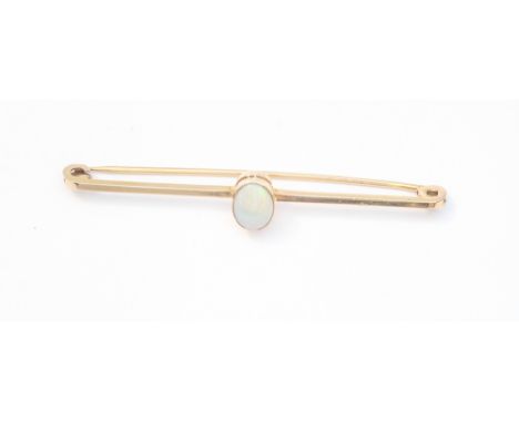 9ct gold bar brooch set with oval opal in Kendall and Dent fitted box 