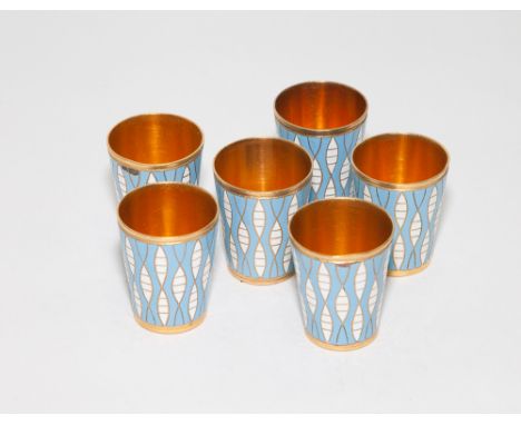 Set of six Russian enamel gilt metal beakers, mid 20th century   Condition - one has minor enamel damage 
