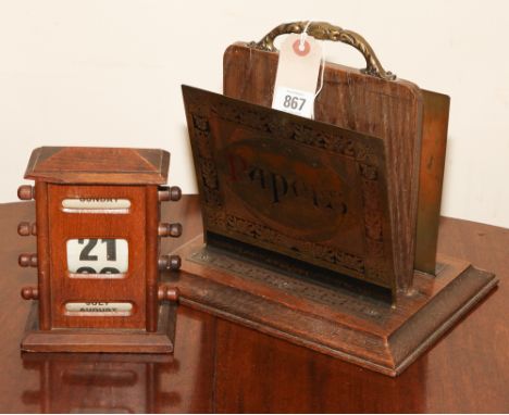 Vintage brass and oak letter rack and a perpetual desk calendar   Calendar rolls all working, there is a chip of wood off fro