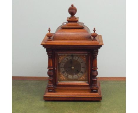 Edwardian bracket clock in walnut case with square brass and silver dial and striking movement 
