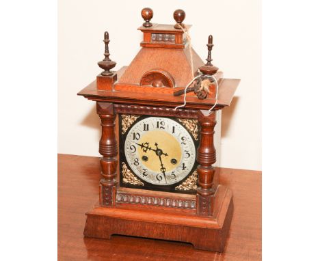 Edwardian striking bracket clock with brass and silver dial in oak case 