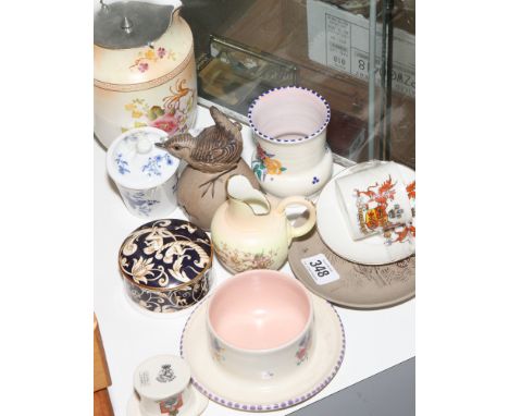 Small Worcester jugs, pieces of Poole and various other ornamental items 