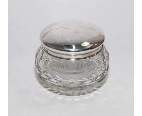 Cut glass circular dressing table jar with hallmarked silver lid 