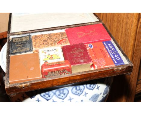 Vintage playing cards and games in box 