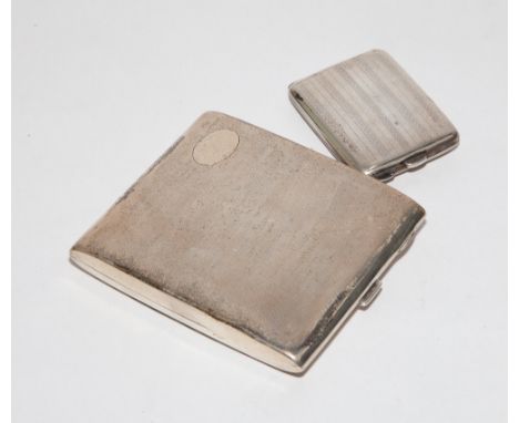 Hallmarked silver engine turned cigarette case and a similar vesta case.  Combined weight 5.6oz troy. 