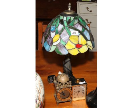 Tiffany style table lamp and decorative shade, small lantern style clock and one other 