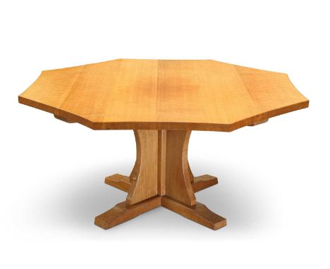 ROBERT THOMPSON OF KILBURN, A MOUSEMAN OAK OCTAGONAL DINING TABLE with cruciform base, adzed, with carved mouse signature. 74