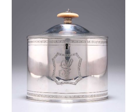 A GEORGE III SILVER TEA CADDY § by Henry Chawner, London 1793, oval, bright-cut engraved, initialled. 13cm high, 13.5cm wide,