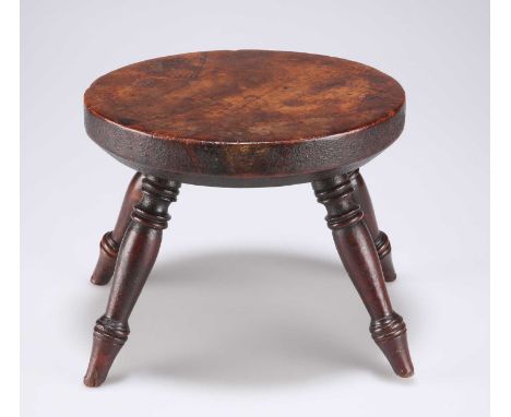 AN 18TH CENTURY WALNUT CANDLESTOOL with oval top and ring-turned splayed legs. Top 21cm wide