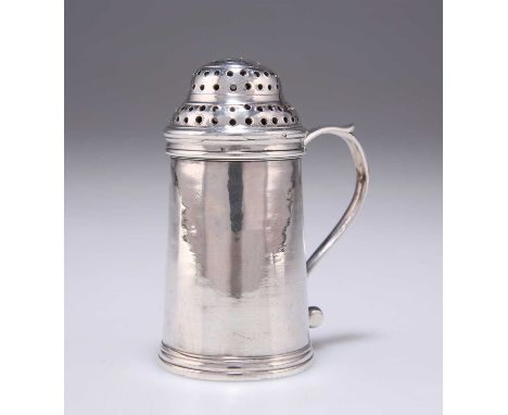 A MID-18TH CENTURY IRISH SILVER KITCHEN PEPPER crowned harp and Hibernia visible, cylindrical, of typical form. 8cm high, 2.5