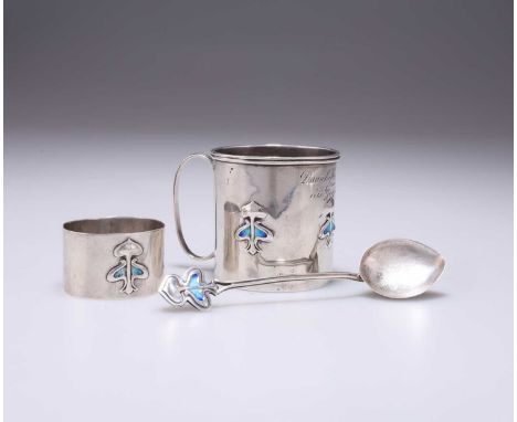 AN ART NOUVEAU SILVER AND ENAMEL CHILD'S SET marks rubbed, Birmingham 1906, comprising christening mug, napkin ring and spoon