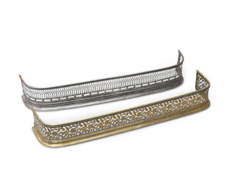 TWO 19TH CENTURY FENDERS the first pierced steel, the second pierced brass. (2) Steel fender 114cm wide