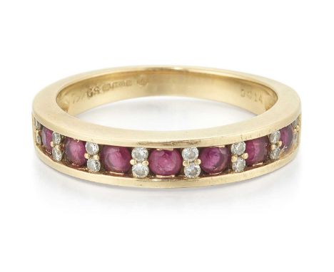 AN 18 CARAT GOLD RUBY AND DIAMOND HALF HOOP RING oval-cut rubies spaced by pairs of round brilliant-cut diamonds. Stated tota