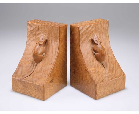 ROBERT THOMPSON OF KILBURN, A PAIR OF MOUSEMAN OAK BOOKENDS of characteristic form, adzed, each with carved mouse signature. 