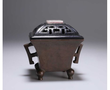 A CHINESE JADE AND BRONZE CENSER the square pierced cover with applied jade plaque, bears cast seal mark. 13cm wide, approx. 