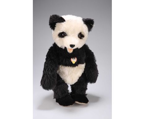 A STEIFF LIMITED EDITION REPLICA 1995 OF THE PANDA BEAR 1951 boxed with certificate.  Height of bear 47cm