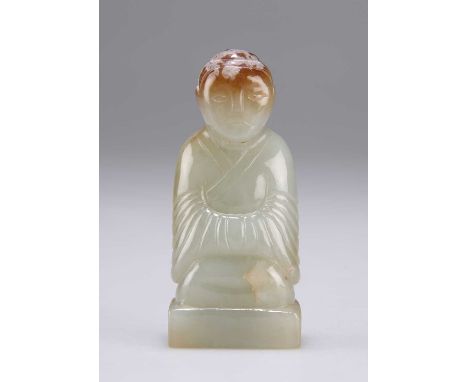 A CHINESE JADE CARVING OF A DEITY 6.3cm high