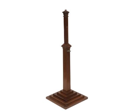 AN ART DECO WALNUT TELESCOPIC STANDARD LAMP of square-section. 150cm high extended