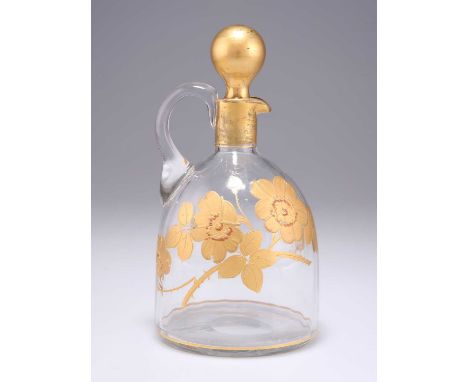 A LATE 19TH/EARLY 20TH CENTURY GILT GLASS DECANTER, POSSIBLY BACCARAT  the tapering body lightly panelled with a short narrow