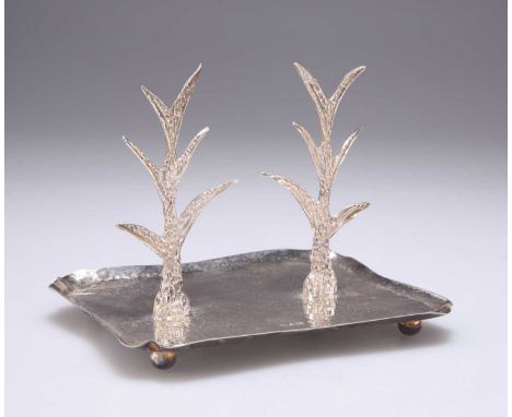 AN EDWARDIAN SILVER DOUBLE RING TREE by White &amp; Reynolds, Chester 1908. 11.5cm wide, 3.1 troy ounces