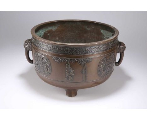 A CHINESE BRONZE JARDINIÈRE, CIRCA 1900 cast with figures and bamboo. 21.5cm highSome dents and surface wear but generally in