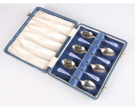 A SET OF SIX GEORGE V SILVER AND ENAMEL COFFEE SPOONS by Jones &amp; Crompton, Birmingham 1928, the terminals enamelled with 