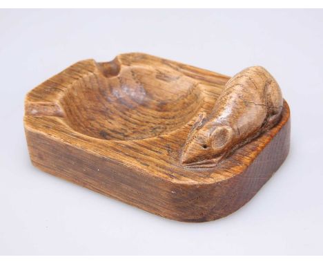 ROBERT THOMPSON OF KILBURN, A MOUSEMAN OAK ASHTRAY of typical form, with carved mouse signature. 10.1cm wideSmall chip to one